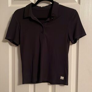 Vuori Pose fitted polo. Color black Size M